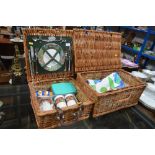 Two wicker picnic hampers and contents