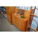 A 1970's oak veneered sideboard AF