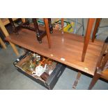 A reproduction mahogany coffee table