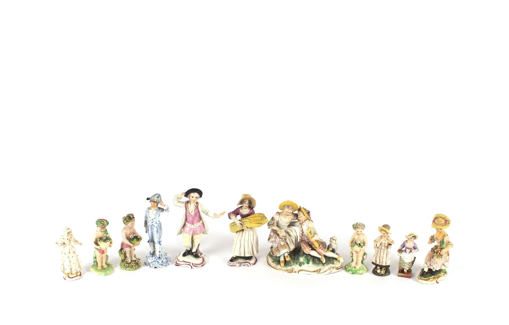 A collection of eleven English and Continental porcelain figures, some AF