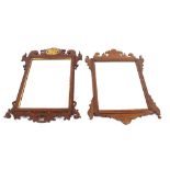 A 19th Century mahogany and gilt fret carved wall mirror, in the Chippendale manner, having bevelled