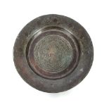 An Eastern metal shallow dish, with foliate engraved decoration, 31cm dia.