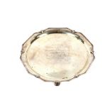 A white metal Indian salver, with presentation inscription