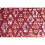 An Eastern rug, with multi stylised floral decoration, flat weave ends, 184cm x 113cm