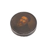 A 19th Century circular papier mache snuff  box, the lid decorated with a bearded figure
