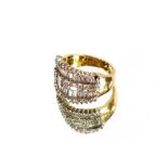 A yellow metal ring, set rows of baguette diamonds alternating with 4 brilliant cut diamonds in