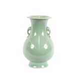 A Chinese celadon ground baluster vase, having under-glazed blue character mark to base, 37cm high