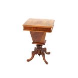 A Victorian burr walnut sewing table, the rectangular quarter veneered top opening to reveal a
