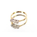 A three stone diamond 18 carat gold ring