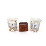 A pair of Queen Victoria Diamond Jubilee commemorative enamel beakers; and an unusual brown