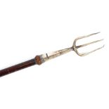 A late Victorian mahogany and silver toasting fork, hallmarked for London 1901, 83cm long