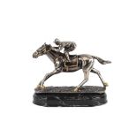 A silvered figure, depicting horse and jockey on marble plinth, 27cm