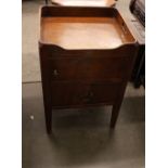 A Georgian mahogany tray top bedside cupboard, enclosed by a single door, fitted deep drawer