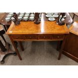 A walnut and herringbone banded side table, of small proportions, fitted four drawers and raised