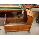 An Antique pine cradle