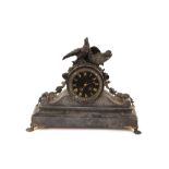 A 19th Century black marble and gilt metal mounted mantel clock, with circular Roman numeral dial