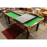 A "rise and fall" quarter size snooker dining table, by Riley, complete with four leaves and