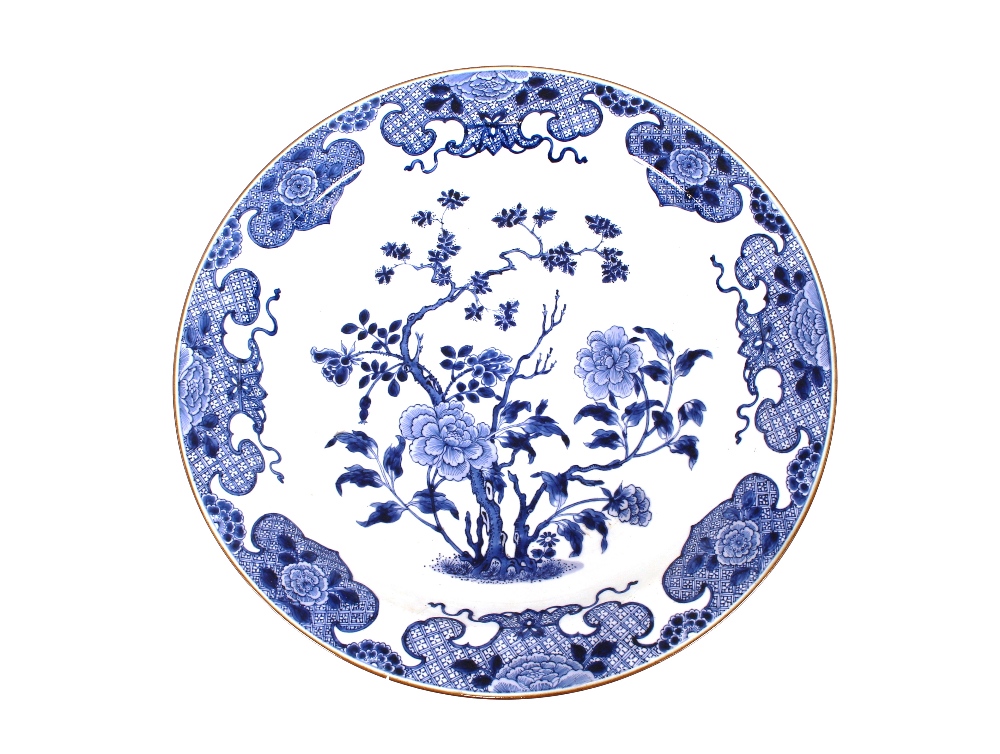A 19th Century Chinese shallow dish, having floral decoration, 39cm dia., AF