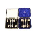 A cased set of six silver teaspoons, having shaped terminals, Sheffield 1925; and five silver rat-