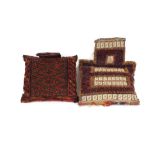 Four Eastern rug cushions