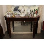 A Victorian mahogany serving table, raised on turned and fluted front supports, 157cm wide