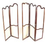 An Edwardian mahogany four fold draught screen, having partly glazed and fabric lined panels