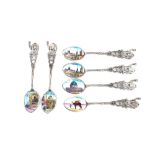 Six Middle Eastern white metal spoons, the bowls with decoration of Jerusalem and desert scenes,