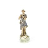 A Royal Dux porcelain figure, depicting a shepherd boy with pipes, AF, 30cm high