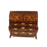 An 18th Century Dutch marquetry cylinder bureau, the front opening to reveal an interior arrangement