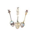 Three decorative enamel souvenir spoons