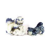 A Chinese porcelain Dog of Fo, having raised decoration, 24cm long and a Dog of Fo fighting group,