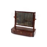 A 19th Century mahogany bow fronted swing toilet mirror, fitted three drawers to the base, 51cm