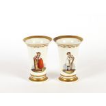 A pair of Bloor Derby porcelain spill vases, decorated with rural figures heightened in gilt, 12cm