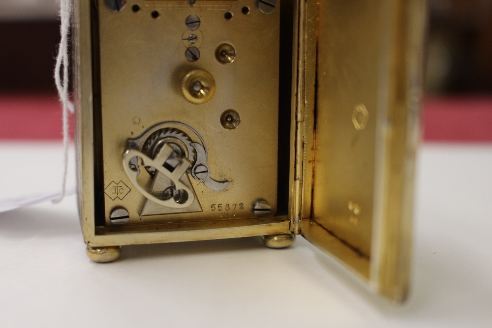 A miniature silver gilt carriage clock, contained in a leather folding travelling case - Image 5 of 5
