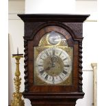 An 18th Century walnut and marquetry long case clock, by Andrew Dunlop, London, the arched fret
