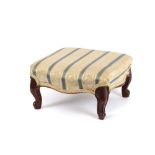 A small 19th Century walnut framed cabriole legged foot stool,
