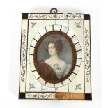 A classical style plaque, in simulated maple frame and a miniature portrait study in faux ivory