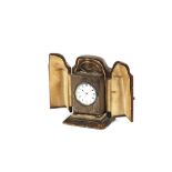 A miniature silver gilt carriage clock, contained in a leather folding travelling case