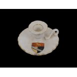 A collection of various crested china items to include: Toby jugs, chambersticks, top hat etc.,