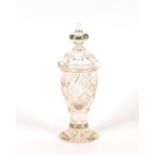 A good quality cut glass chestnut jar and cover, having split decoration, raised on a circular foot,