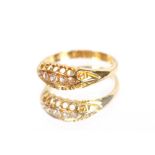 An 18 carat gold boat shaped diamond cluster ring, hallmarked 1918