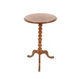 A Victorian mahogany tilt top occasional table, raised on barley twist column and tripod base