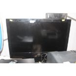 An Alba flat screen television and wall mount