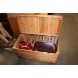 A pine storage box and contents