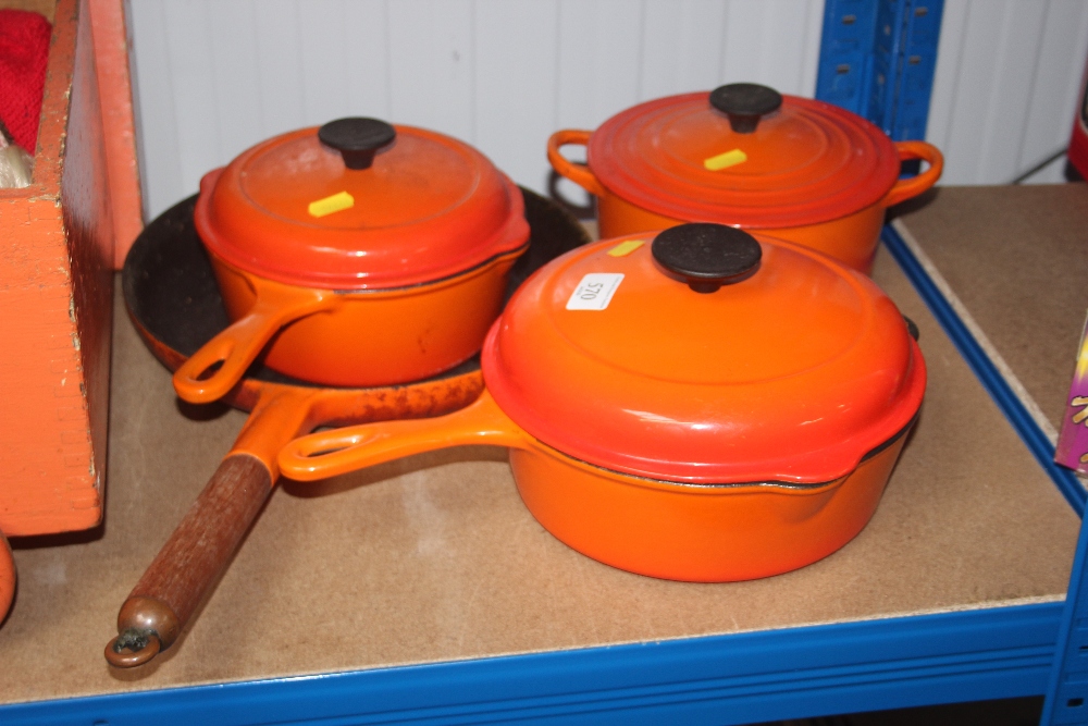 A quantity of Le Creuset cooking dishes