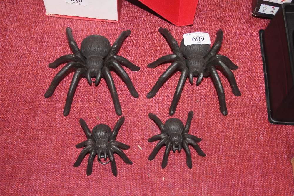 Four metal spiders (122)