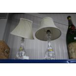 A pair of glass table lamps and shades