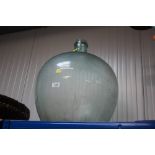 A large glass carboy