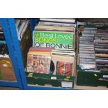 A box of various LPs and singles