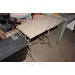 A sand stone treadle sewing machine base